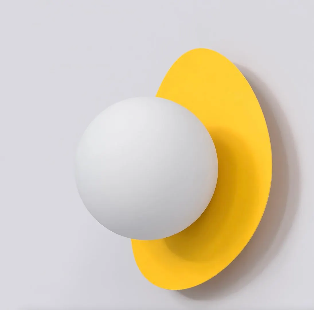 image lampa dekoracyjna, kula biało-żółta, kolor żółty, konstrukcja geometryczna, element dekoracyjny