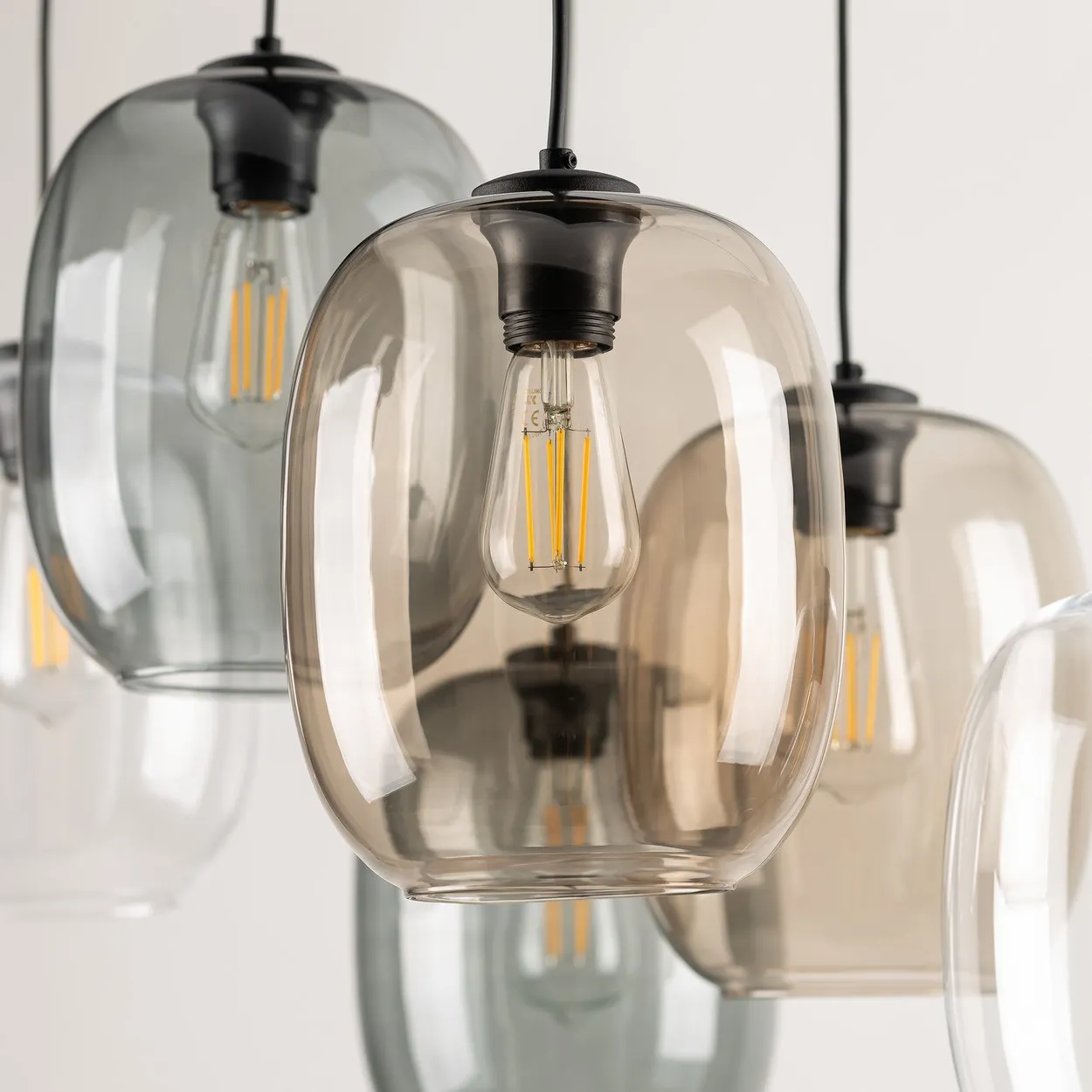 Lampa wisząca ELIO na czarnej podstawie i przewodach 6 różnokolorowych szklanych kloszy przeźroczyste ciemne i brązowe 130x70x40cm - TK_5974