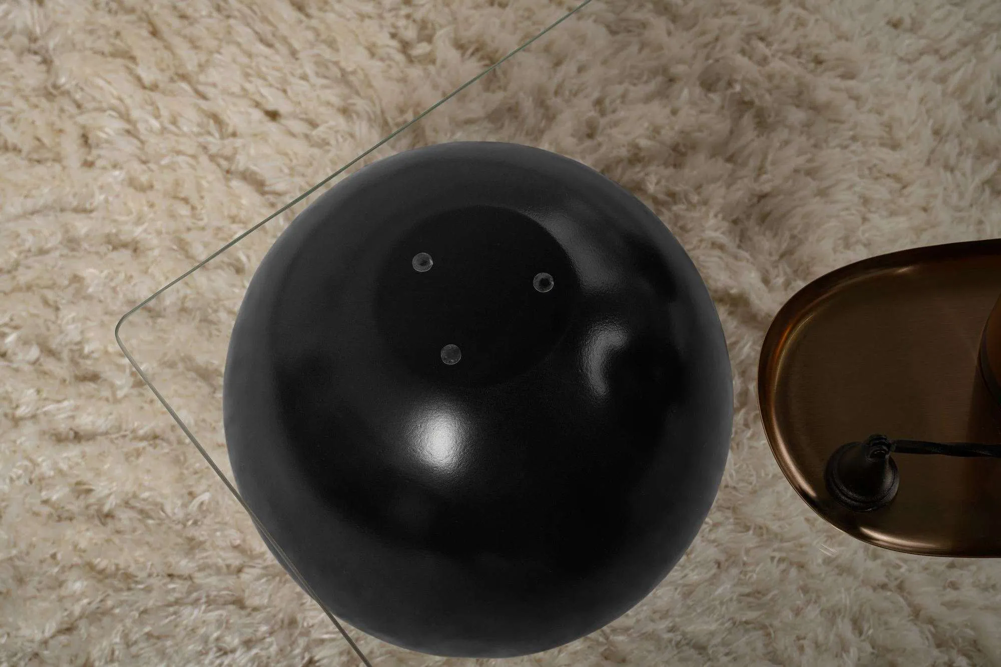 Stolik kawowy SERA 75x110 cm nogi czarne kule blat szklany transparentny - ASI_857NRD1114