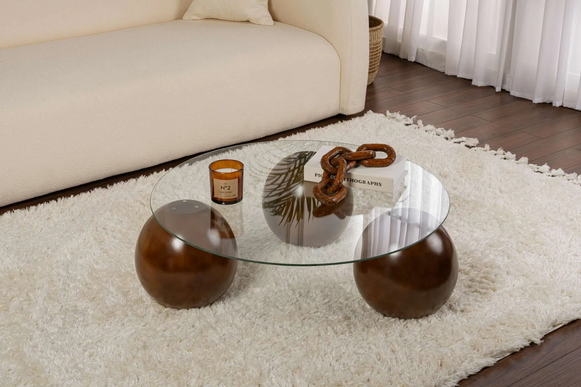 Stolik kawowy szklany okrągły MIRO 85 cm kuliste orzechowe nogi blat transparentny - ASI_857NRD1132