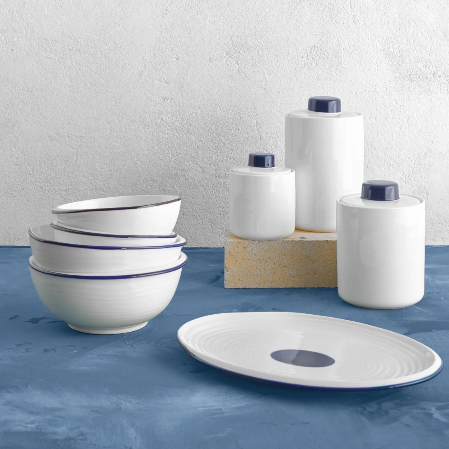 image ceramic dinnerware, white bowls, stacked bowls, porcelain plates, blue rim