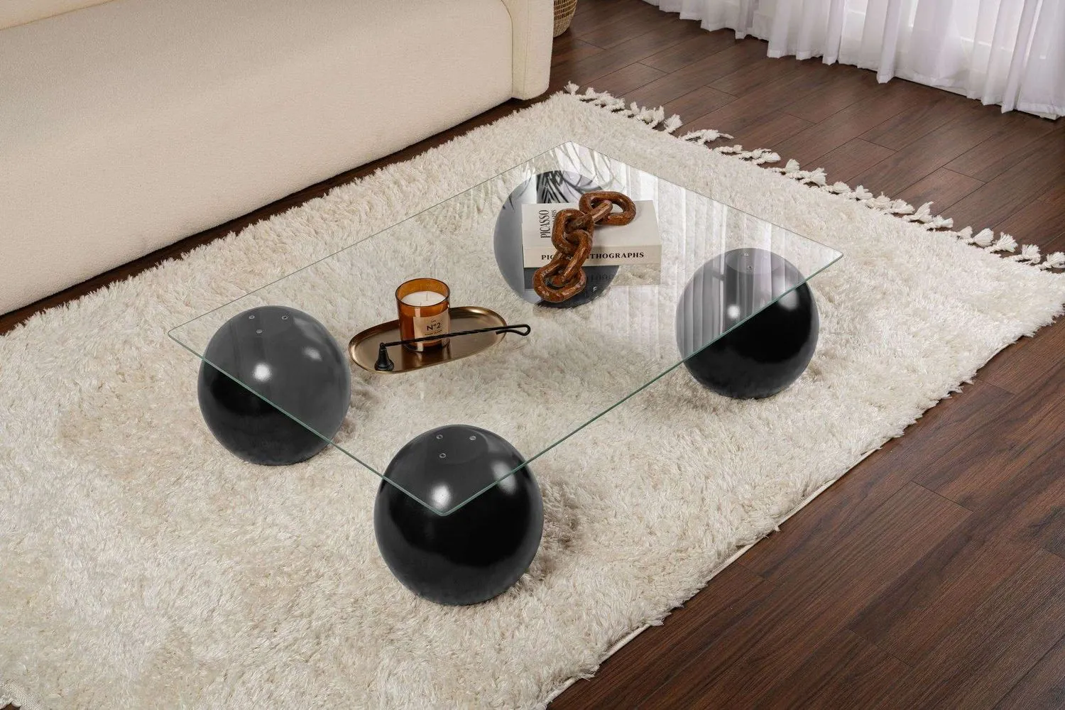 Stolik kawowy SERA 75x110 cm nogi czarne kule blat szklany transparentny — zdjęcie 4
