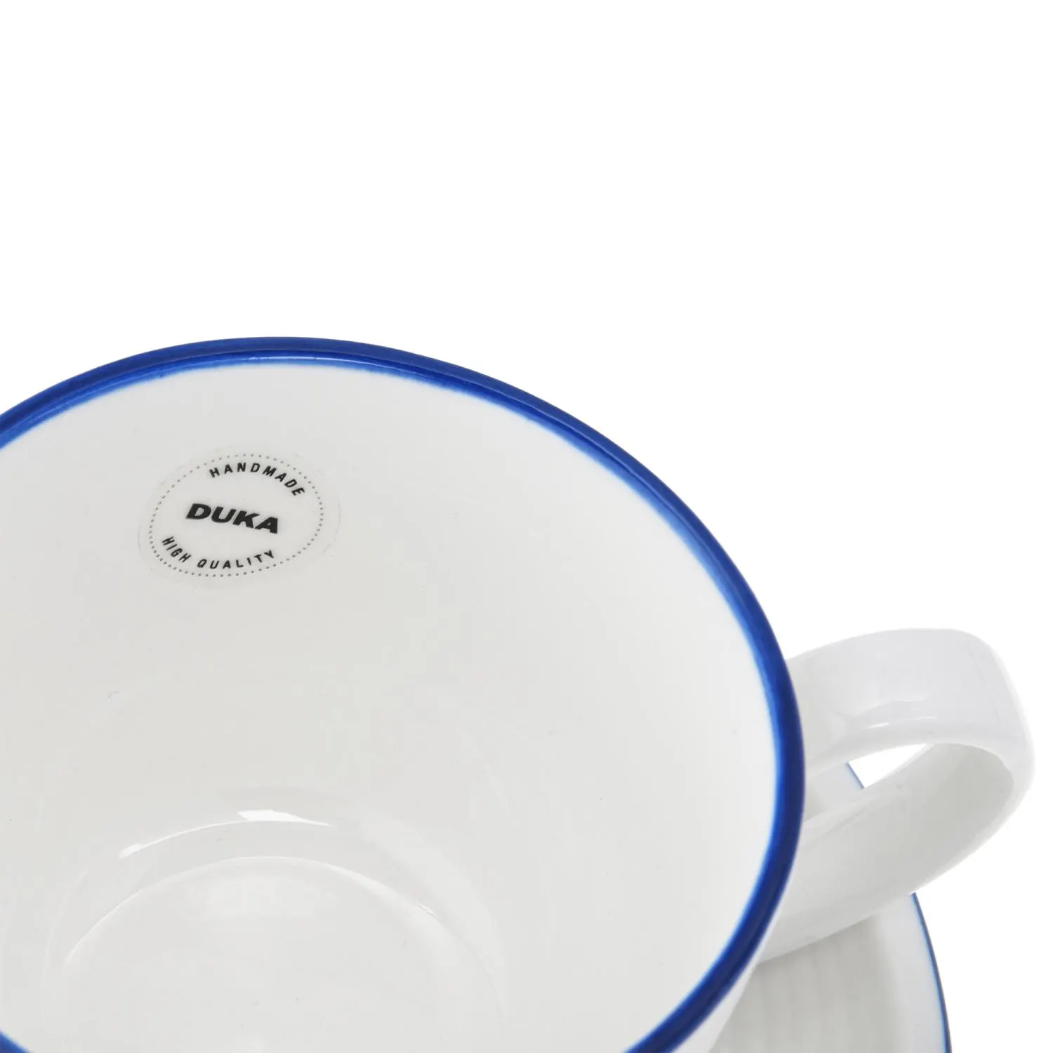 ceramiczny kubek, biały kubek, niebieska obramówka, ręcznie wykonane, DUKA etykieta