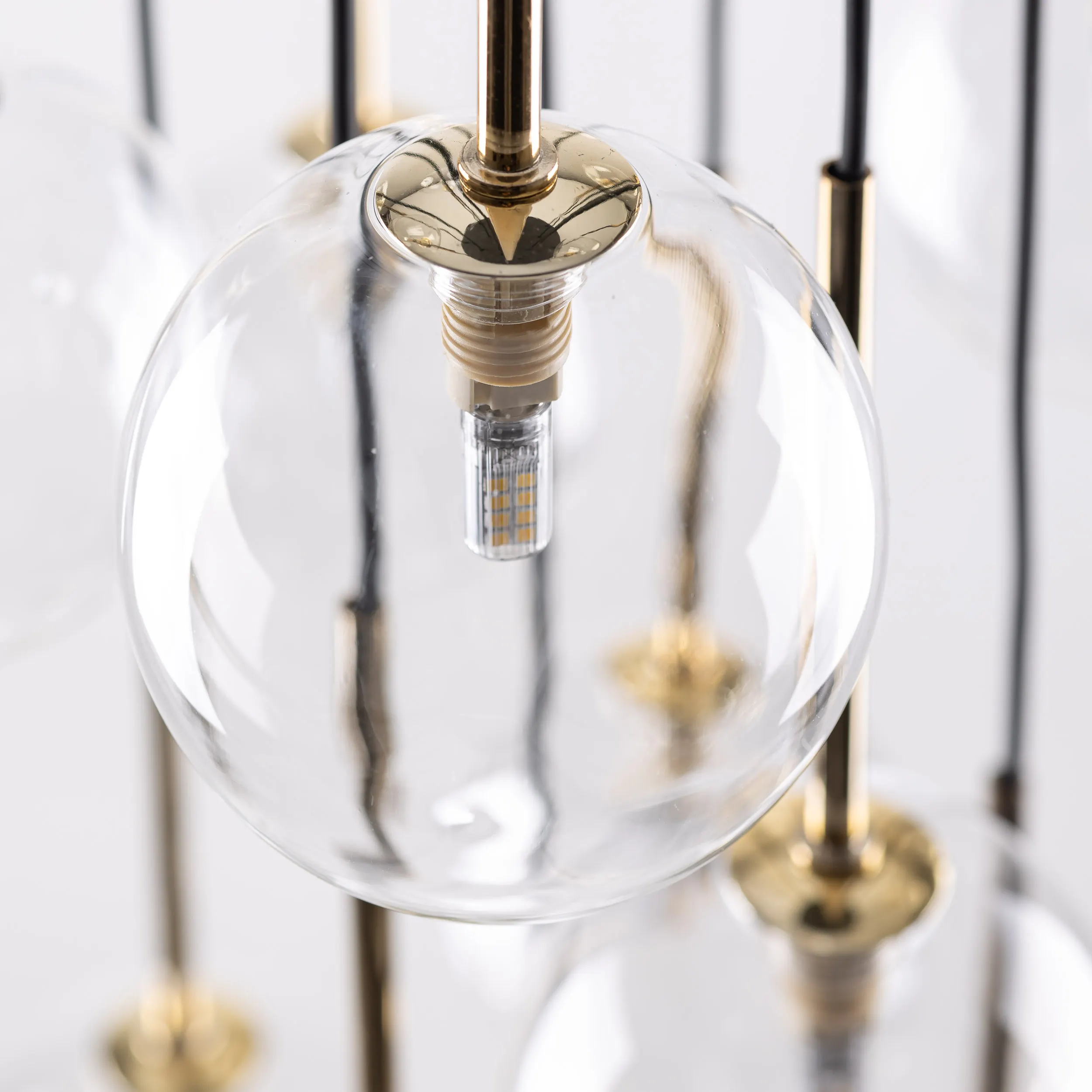 Lampa wisząca NILOS czarna ze złotymi elementami transparentne okrągłe szklane klosze 145x52cm - TK_5945