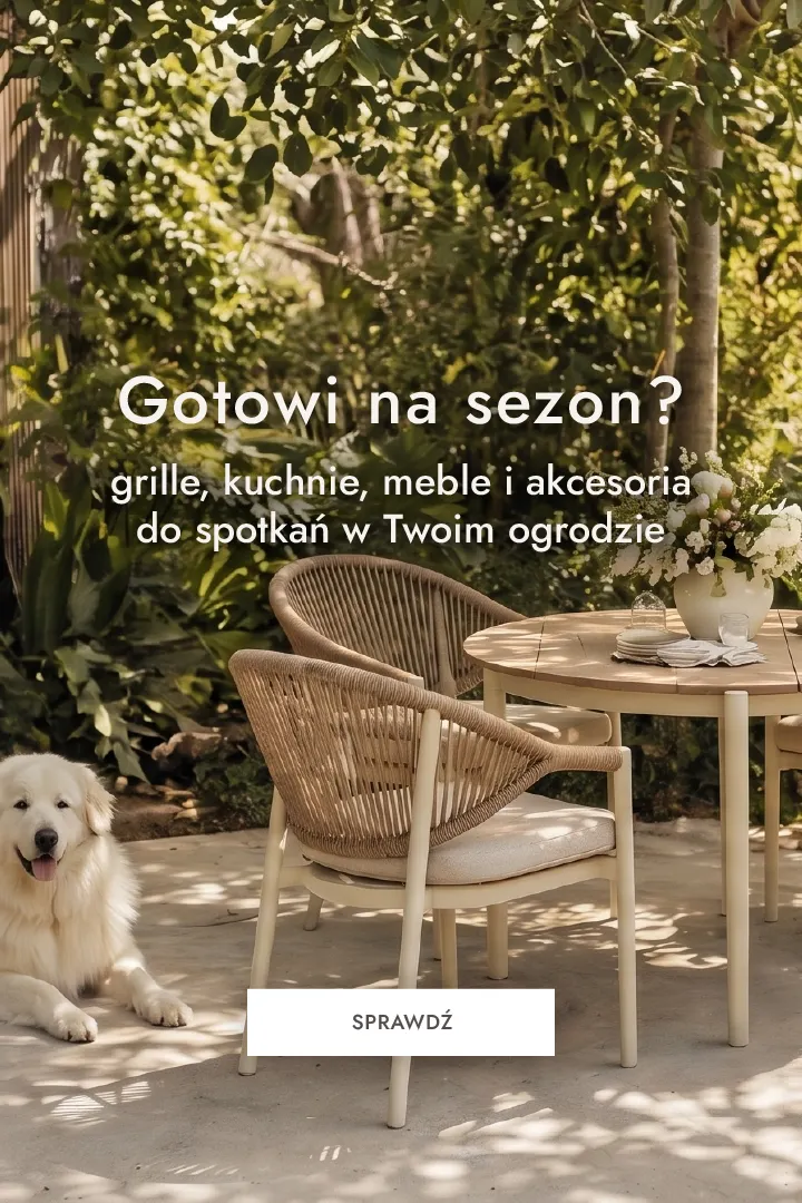 meble ogrodowe, stół ogrodowy, fotele z rattanu, zestaw tarasowy, pies na zdjęciu