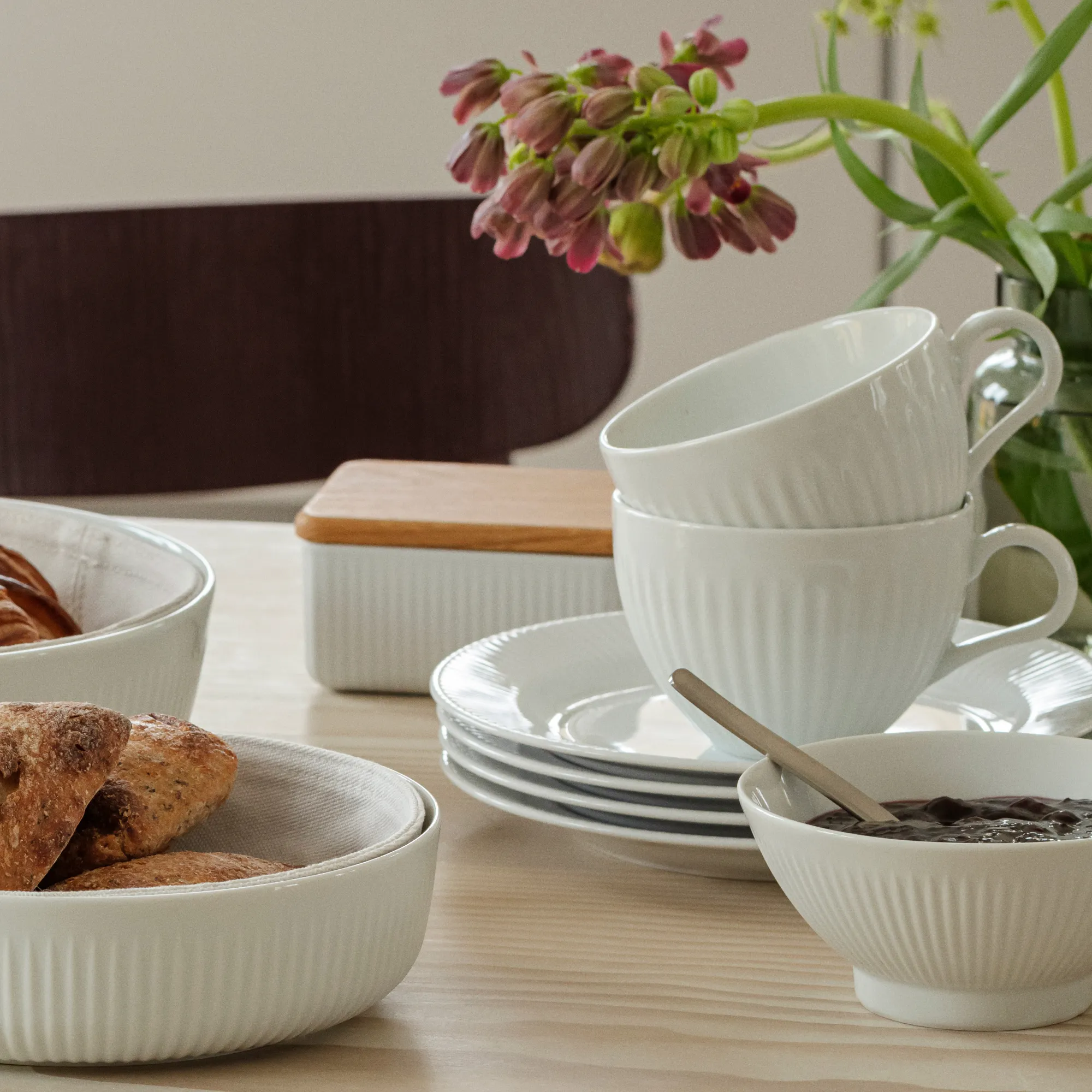 ceramic bowls, stacked cups, white tableware, ridge pattern, breakfast set
