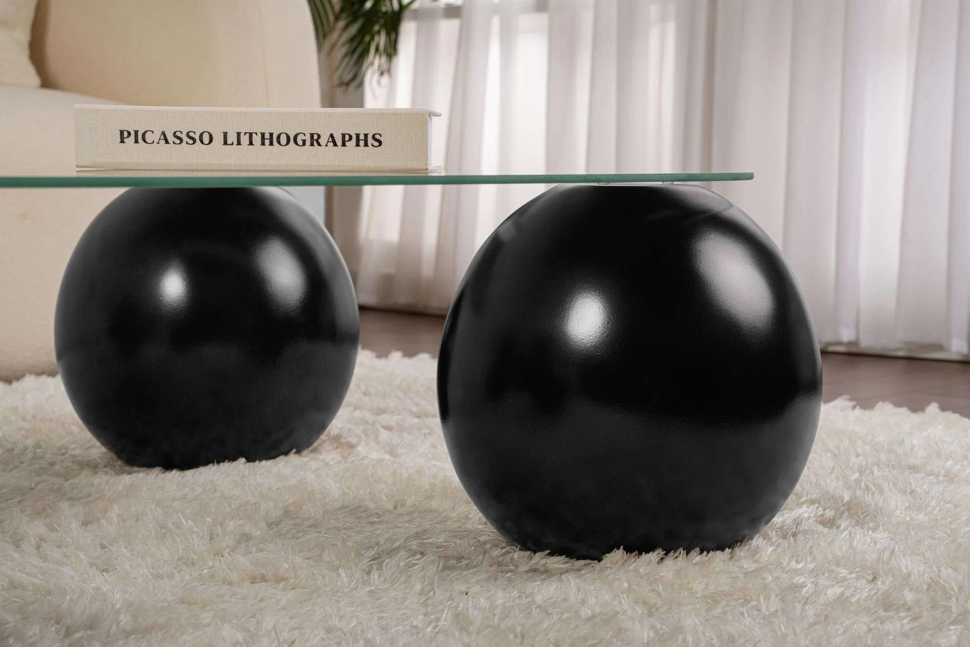 Stolik kawowy EVARA 75x118 nogi kule czarne blat transparentny - ASI_857NRD1115