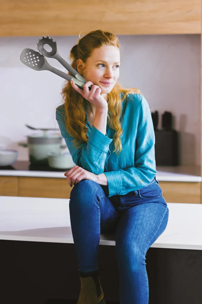 kitchen, woman, utensils, slotted spatula, pasta server