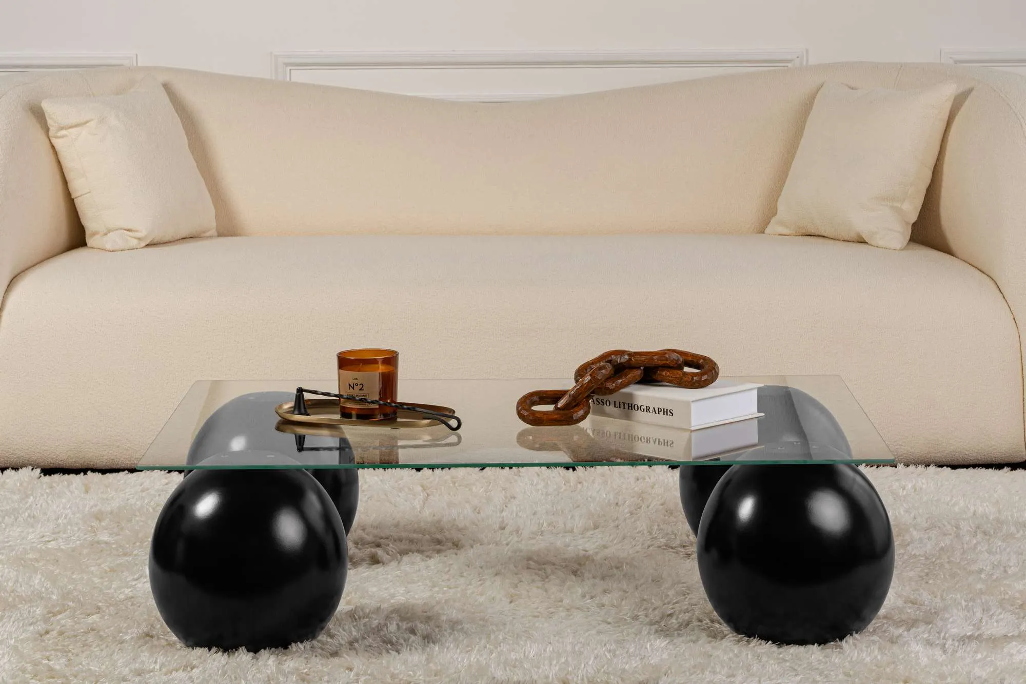 Stolik kawowy SERA 75x110 cm nogi czarne kule blat szklany transparentny — zdjęcie 3
