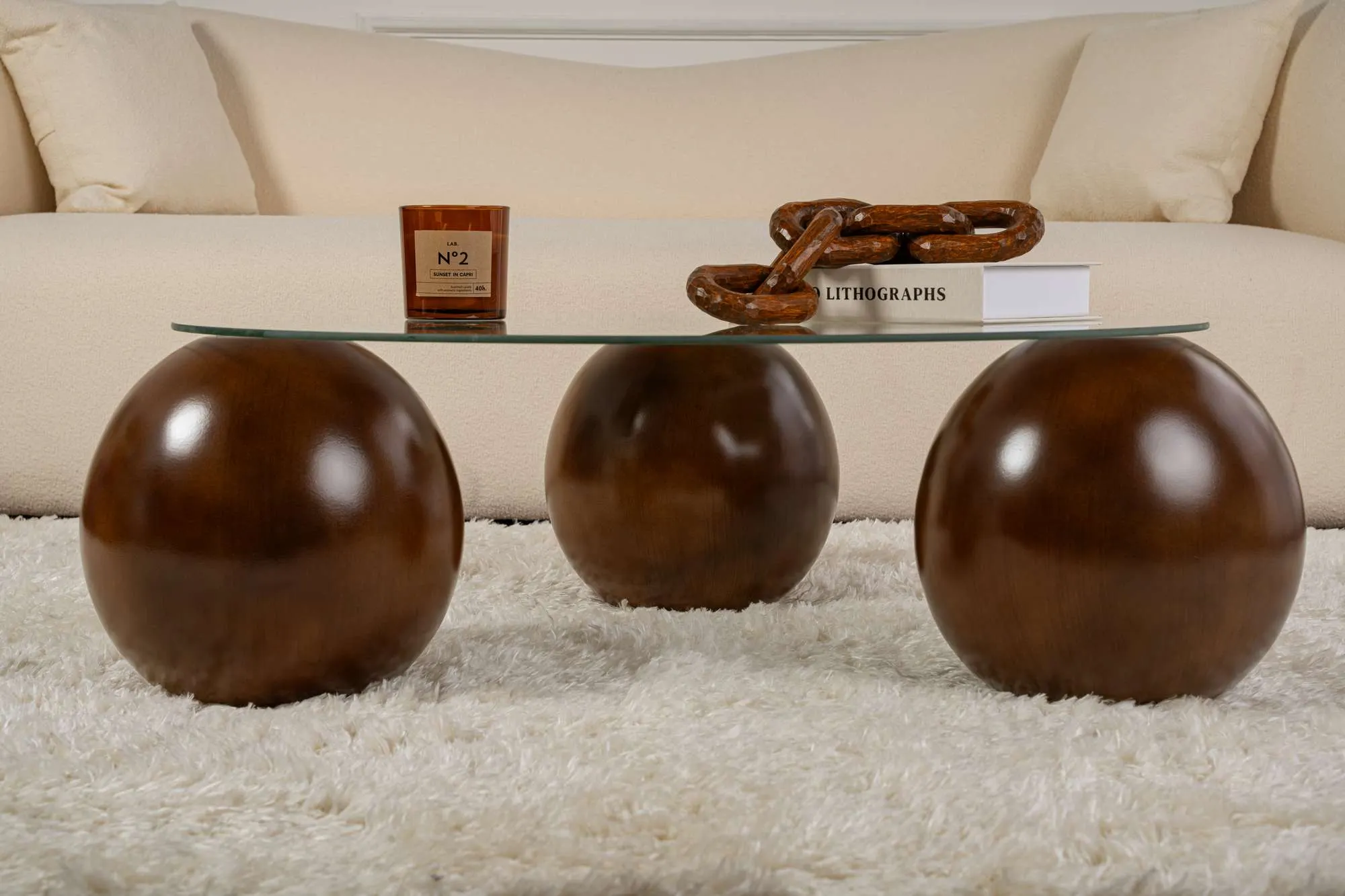 Stolik kawowy szklany okrągły MIRO 85 cm kuliste orzechowe nogi blat transparentny - ASI_857NRD1132