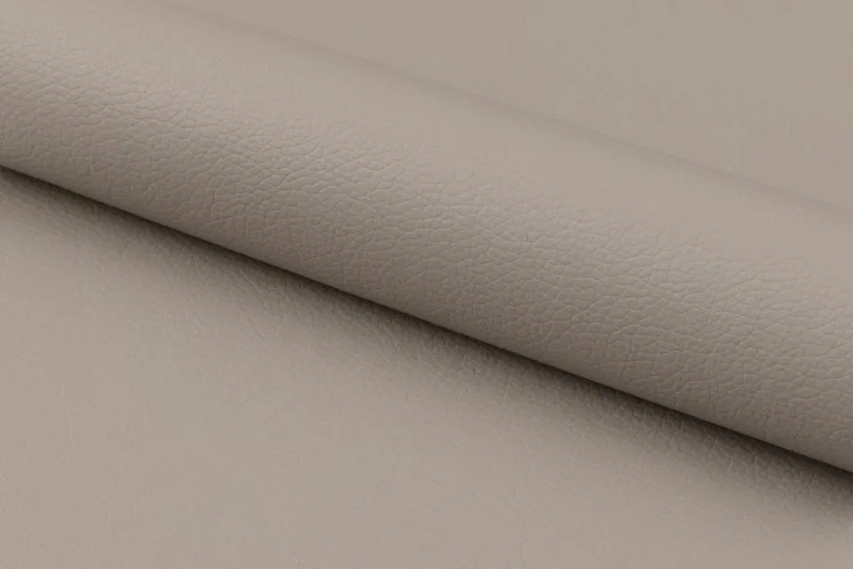 image elegant leather-like material, beige color, skin texture, beige fabric, leatherette texture