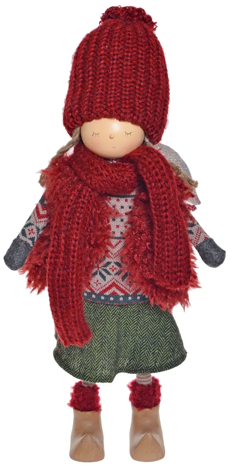 Dziewczynka stojąca w sweterku wielokolorowa Dziewczynka stojąca w sweterku wielokolorowa