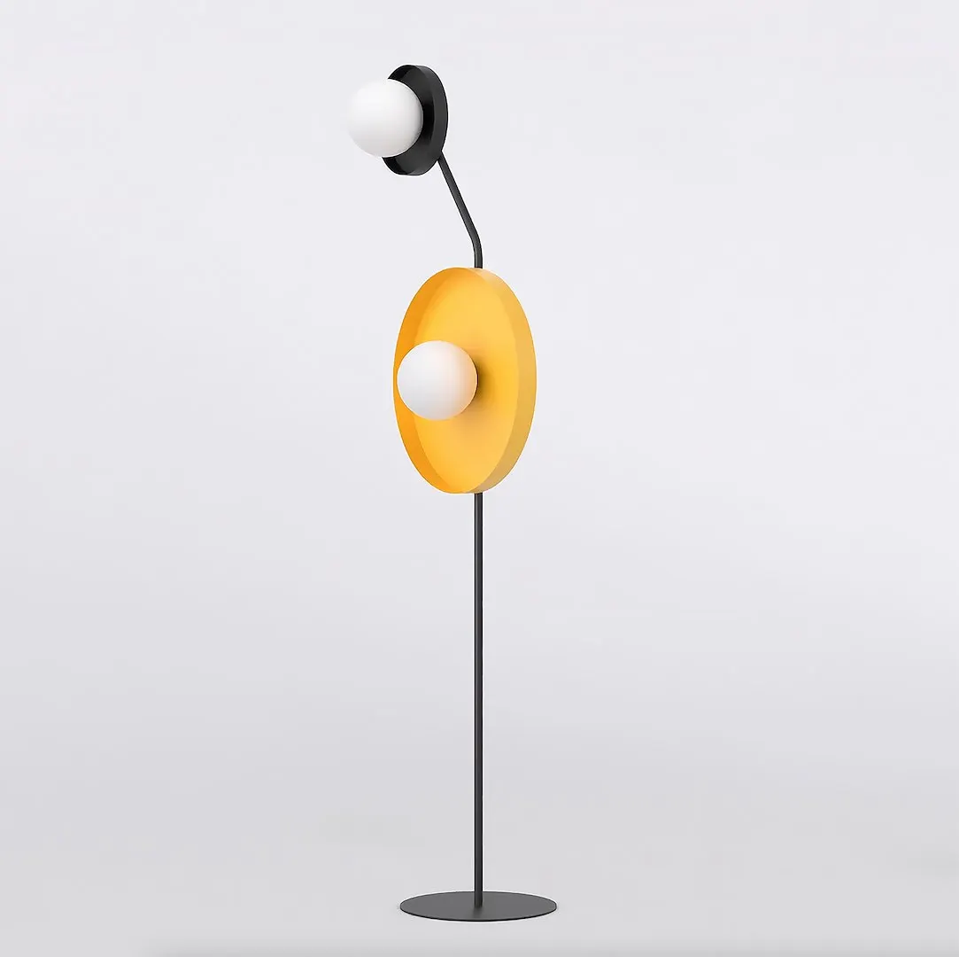 lampa stojąca, nowoczesny design, żółty korpus, korpus okrągły, minimalistyczny element oświetleniowy