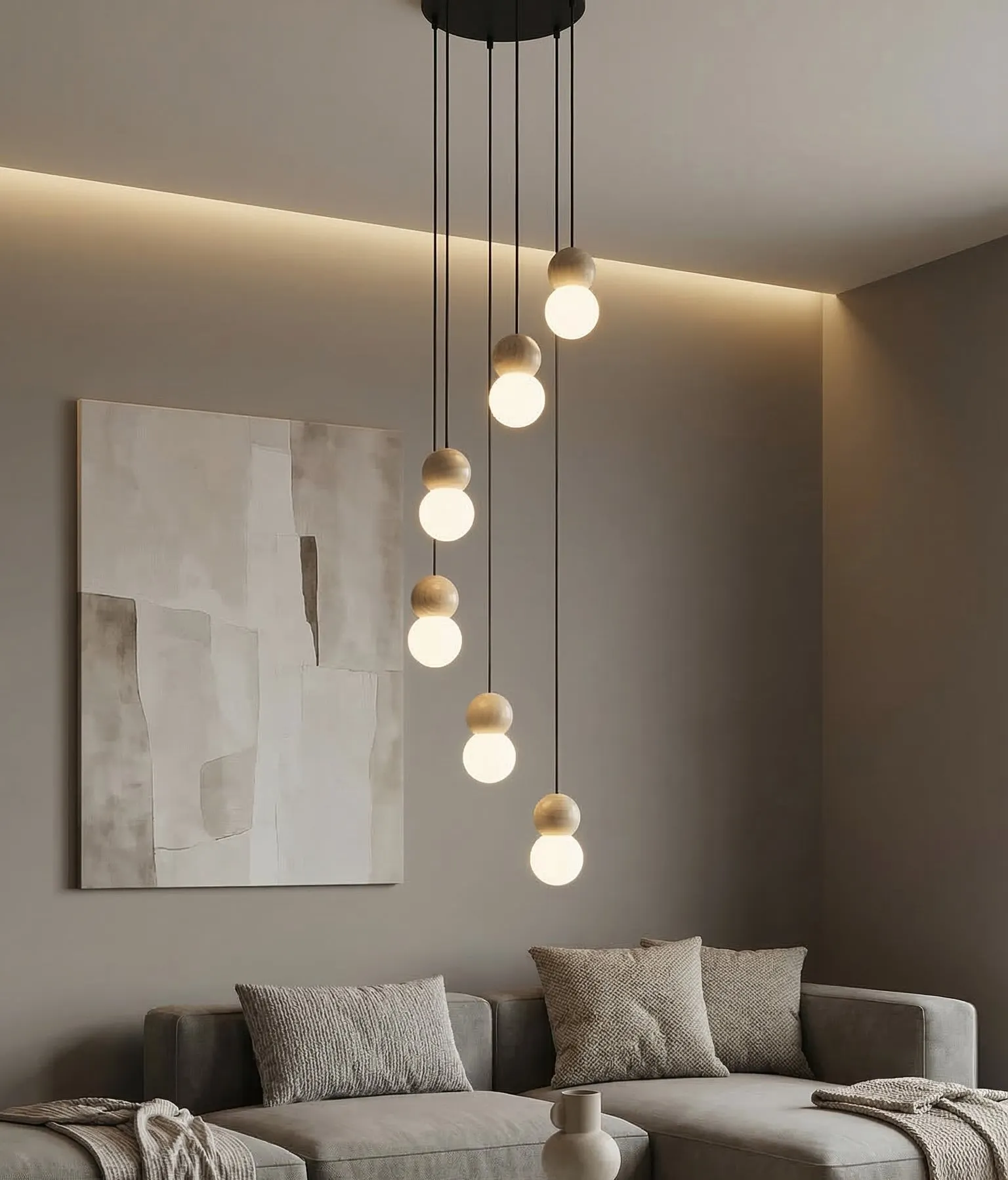 lampa wisząca, kule żarówki, sofa narożna, wnętrze minimalistyczne, obraz artystyczny