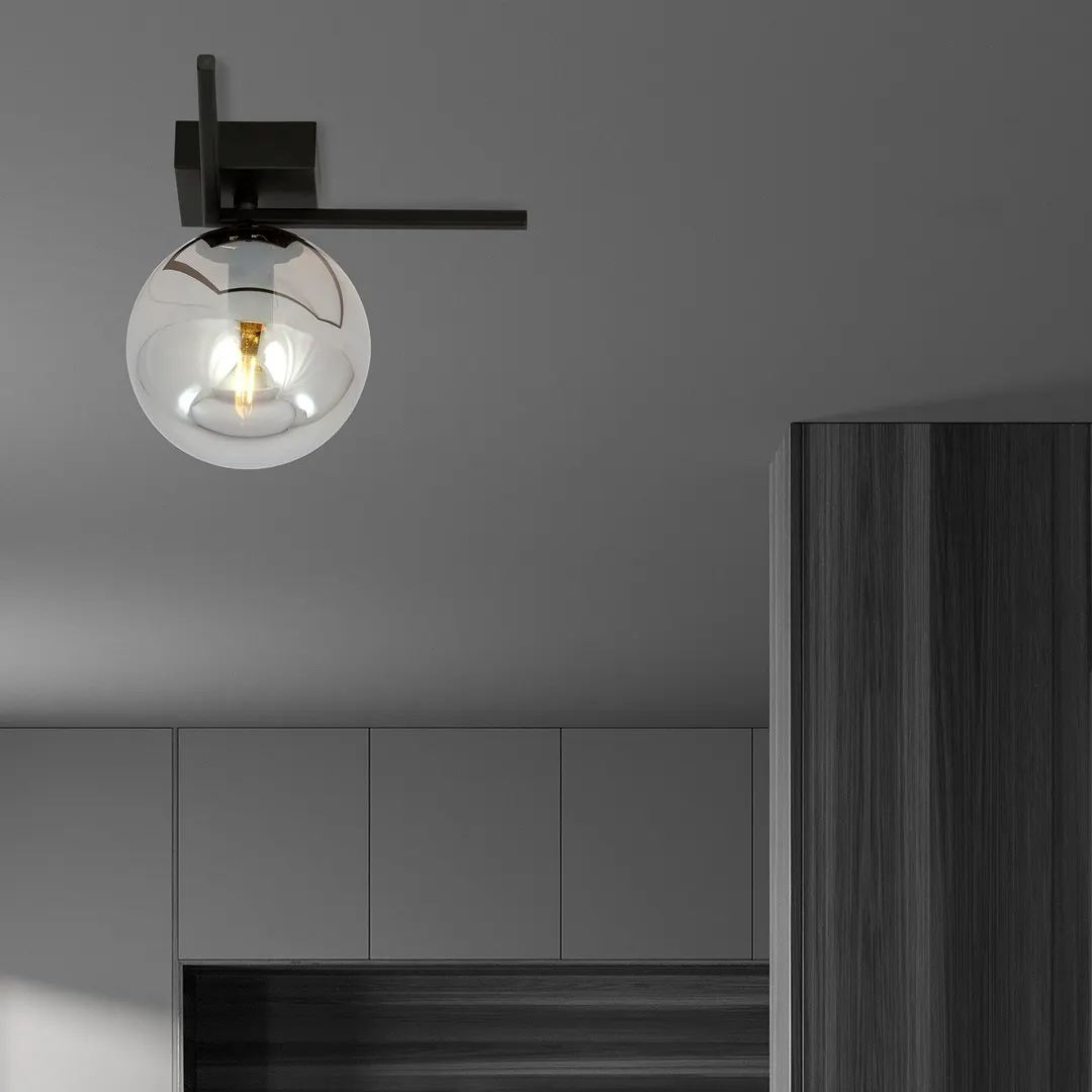 lampa wisząca, czarny metal, szklana kula, nowoczesny design, oświetlenie